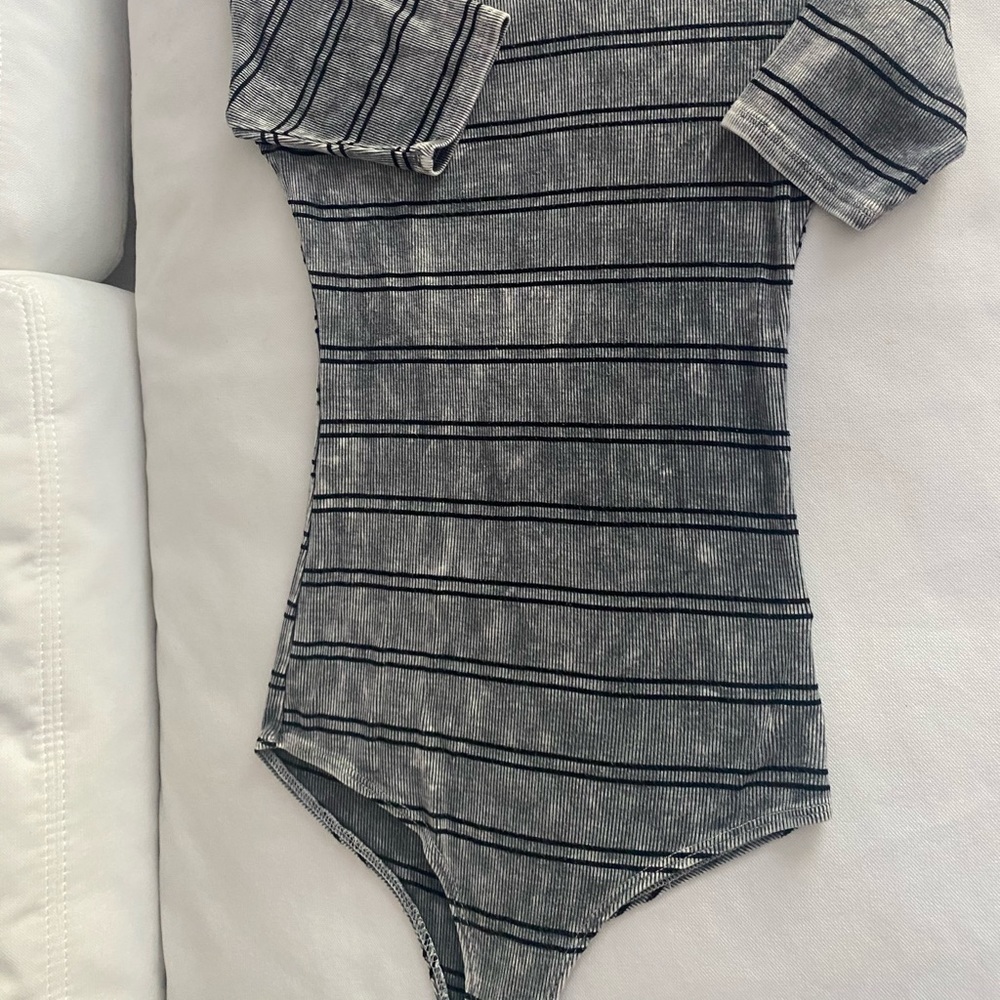 Buckle bodysuit gray and black stripe.